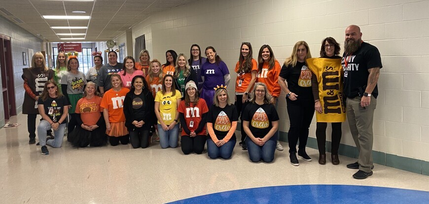 Staff dressed as candy for Halloween.